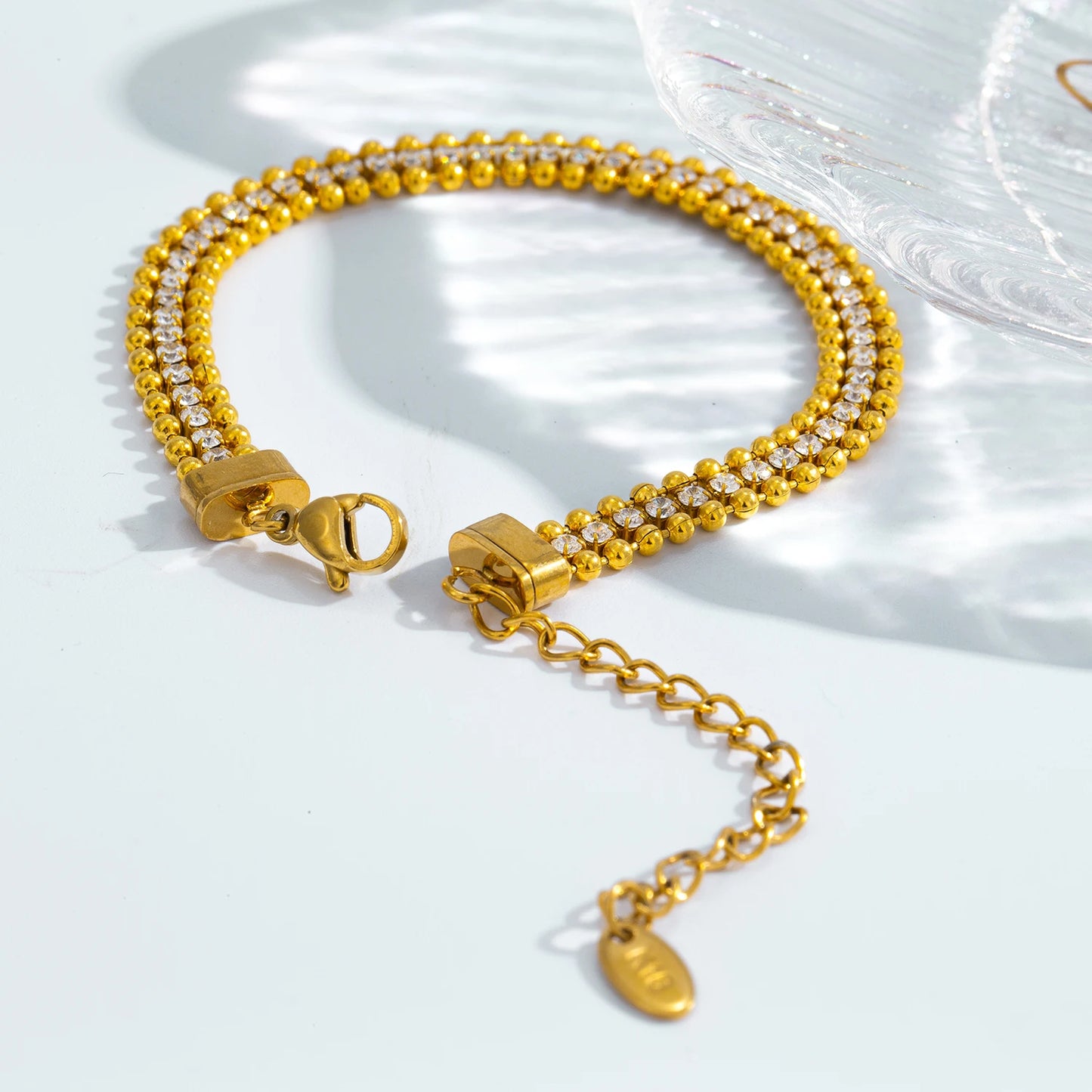 Triple Row Bracelet ✨CZ stones center row, 18K gold-plated stainless steel 💫.